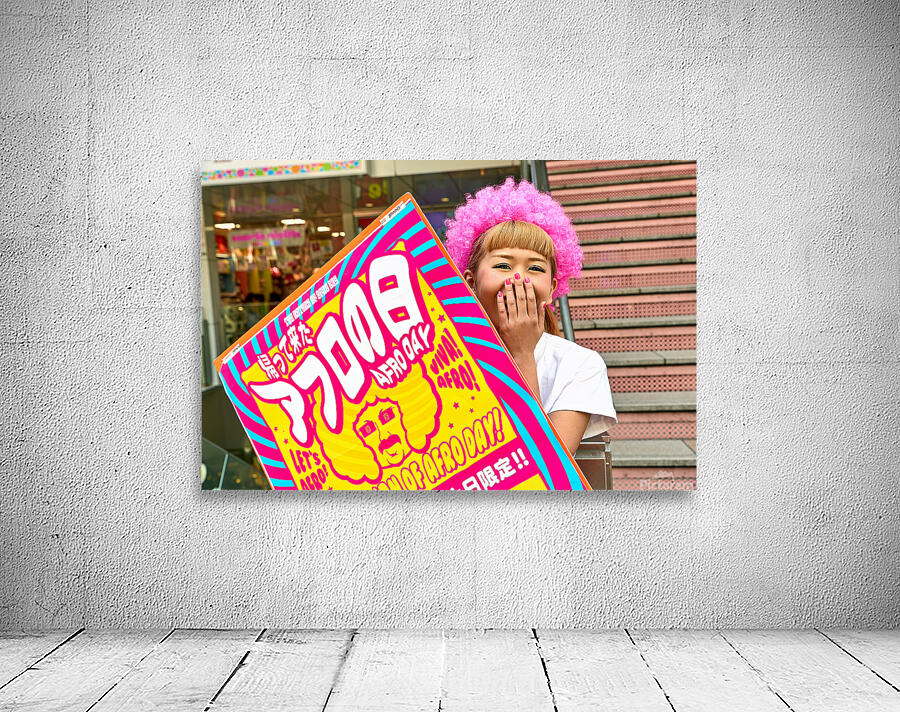 Lolita girl holds sign in Shibuya District of Tokyo during Afro  Wall Preview