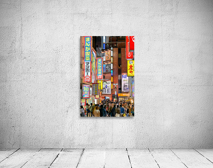 Nighttime crowd under neon lights in Shibuya district in Tokyo Wall Preview