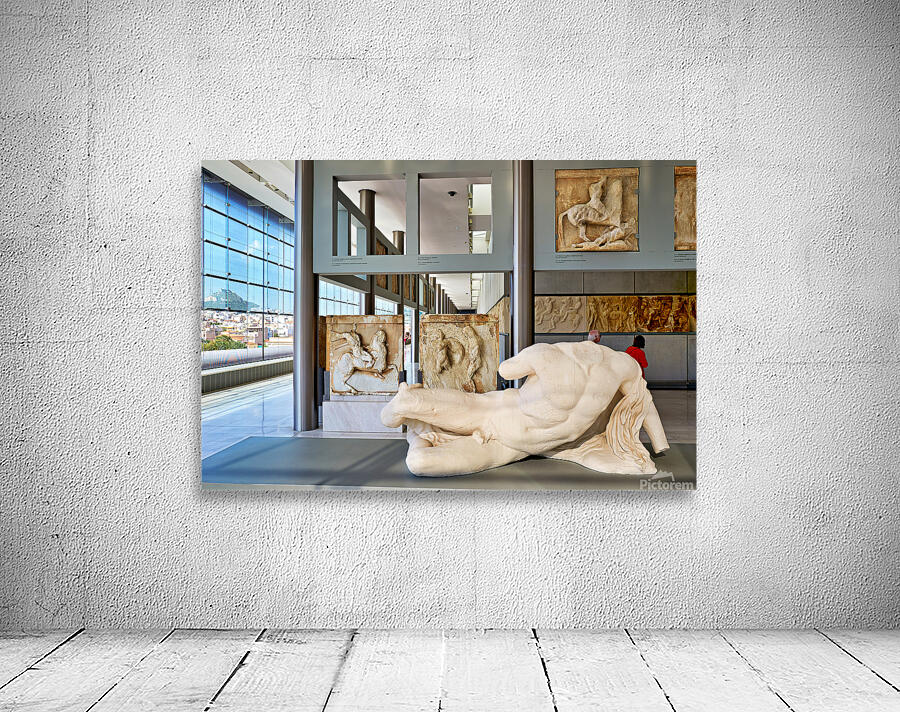 Visitors explore sculptures at Acropolis Museum in Athens Greece Wall Preview