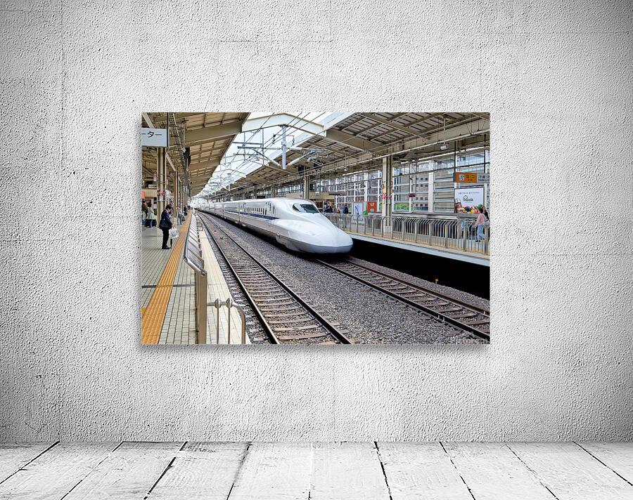 Shinkansen arrives at Kyoto Station in Japan during daylight Wall Preview