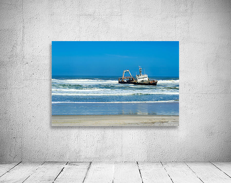 Shipwreck on the Skeleton Coast of Namibia under clear blue sky Wall Preview