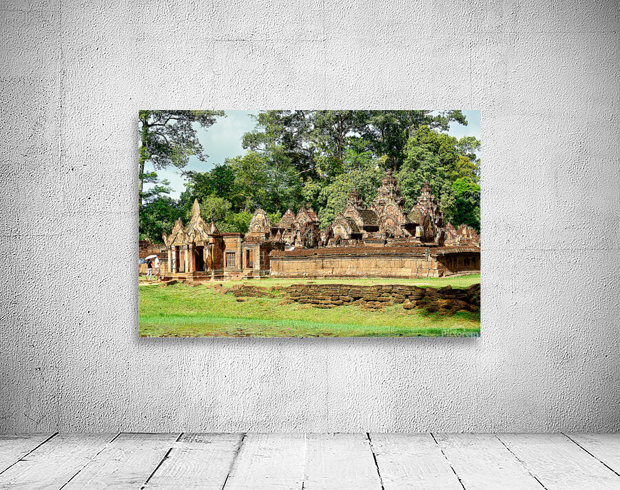 Ancient stone temple complex surrounded by lush jungle and water Wall Preview