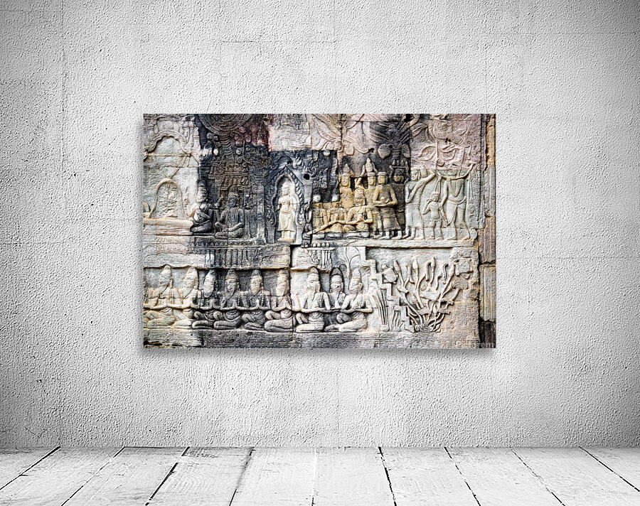 Ancient stone bas reliefs depicting figures and decorative eleme Wall Preview