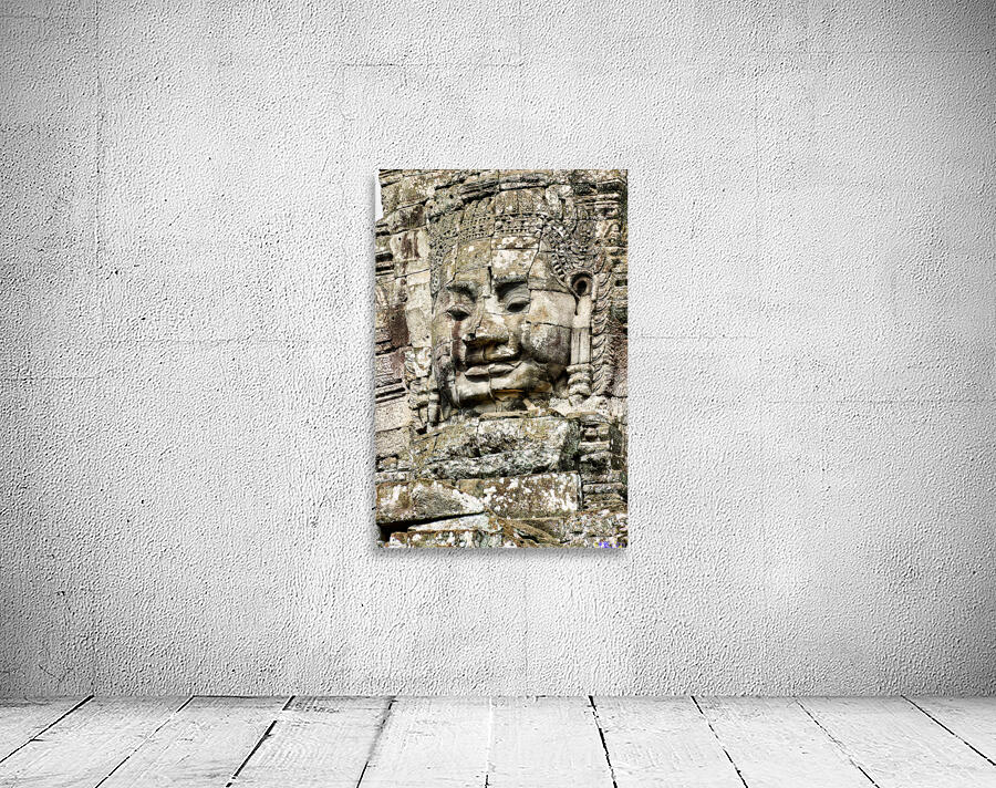 Serene stone face carving Bayon temple Angkor. Wall Preview