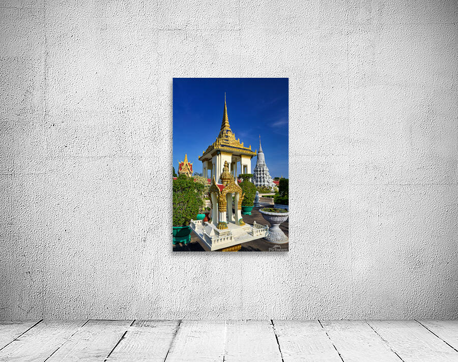 Golden temples and a grey stupa under a clear blue sky. Wall Preview