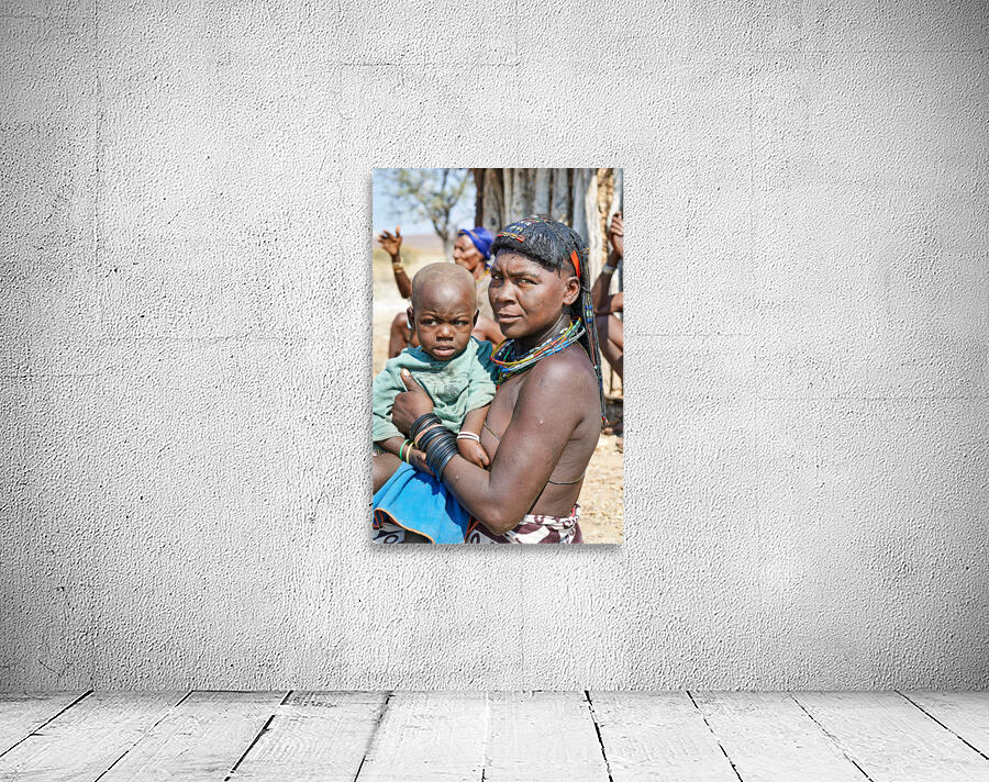 Portrait of young Zemba woman holding child in Kunene Region Wall Preview