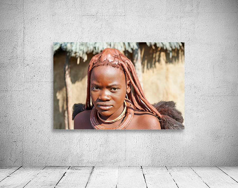 Himba woman in traditional hair headdress in Kunene Region of Na Wall Preview
