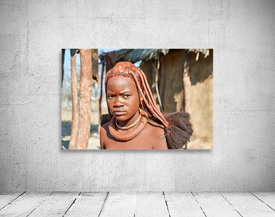Traditional hair headdress of a woman in Himba village of Namibi Wall Preview