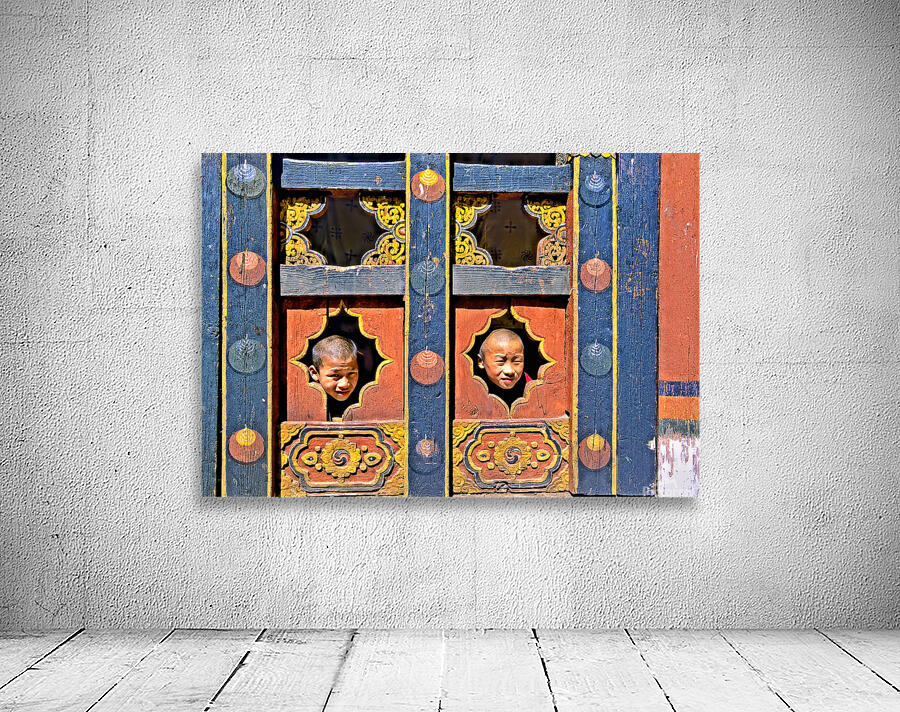 Young monks peeking from decorative colorful windows. Wall Preview