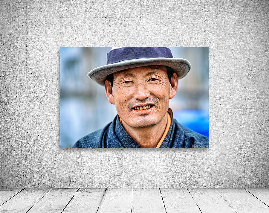 Portrait of a smiling man wearing a hat. Wall Preview