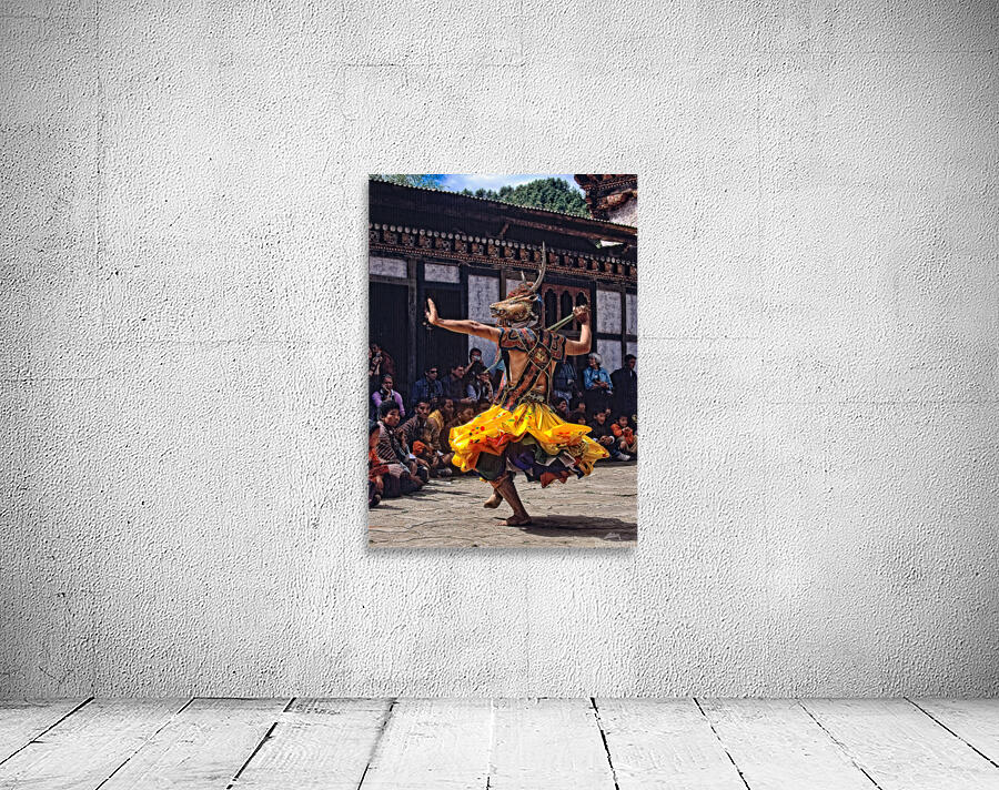 Bhutanese masked deer dancer performs for an attentive audience. Wall Preview