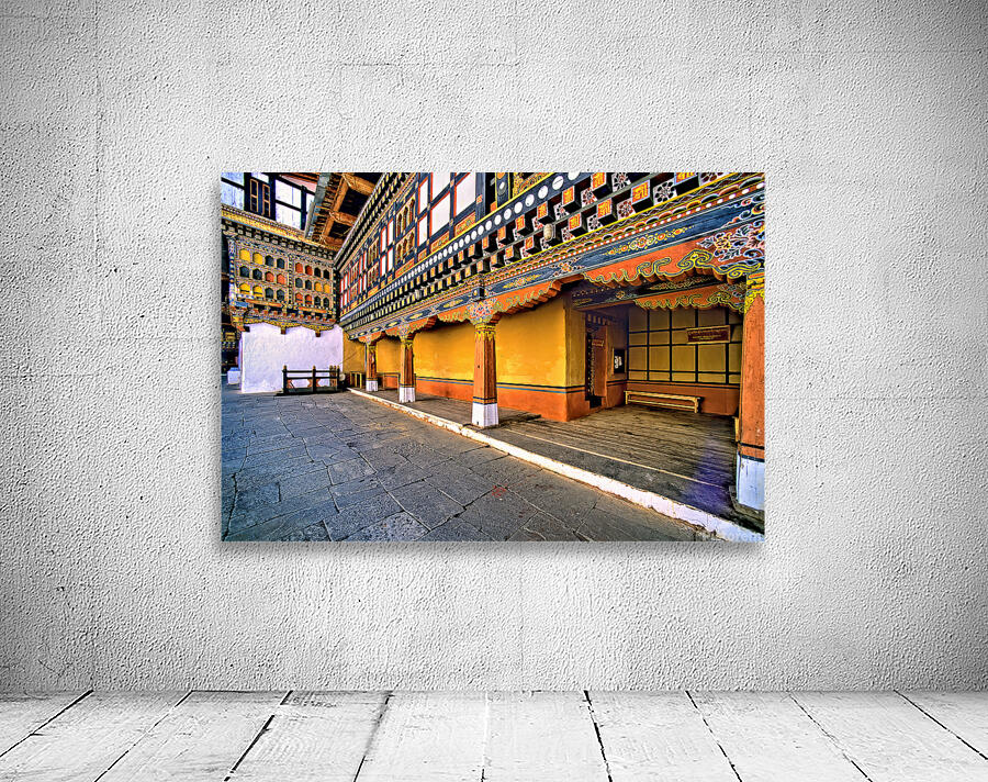Vibrant ornate Bhutanese temple architecture and stone courtyar Wall Preview
