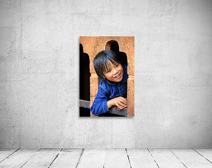 Smiling child peeking from a wooden window. Wall Preview