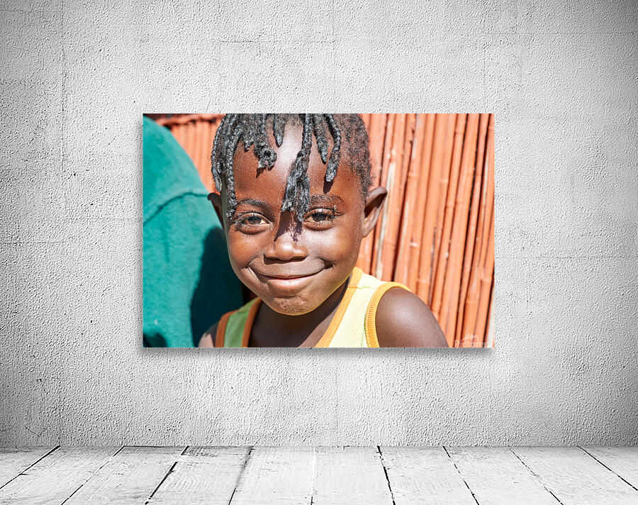 Joyful child smiles in Kavango Region of Namibia Wall Preview