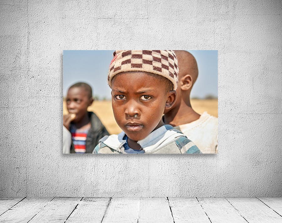 Portrait of a boy in Kavango Region Namibia during the day Wall Preview