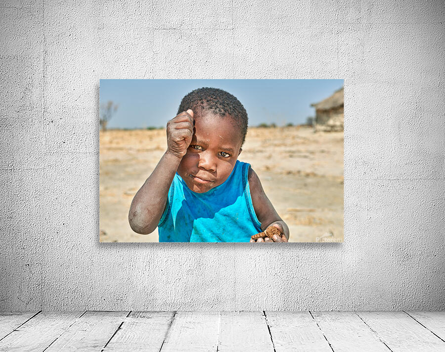 Joyful boy in Kavango Region playing in Namibia Wall Preview