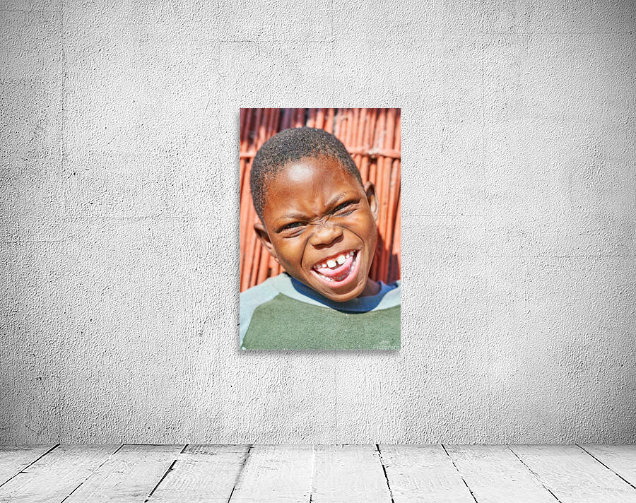 Joyful child smiles in Kavango Region of Namibia Wall Preview