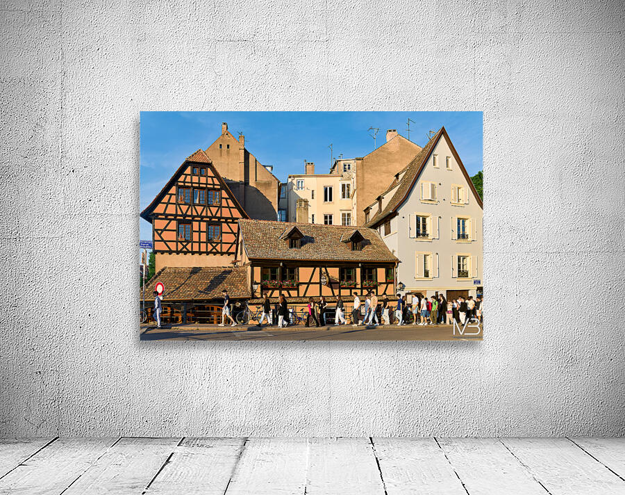 Historic houses and people walking in Petit France Strasbourg Wall Preview