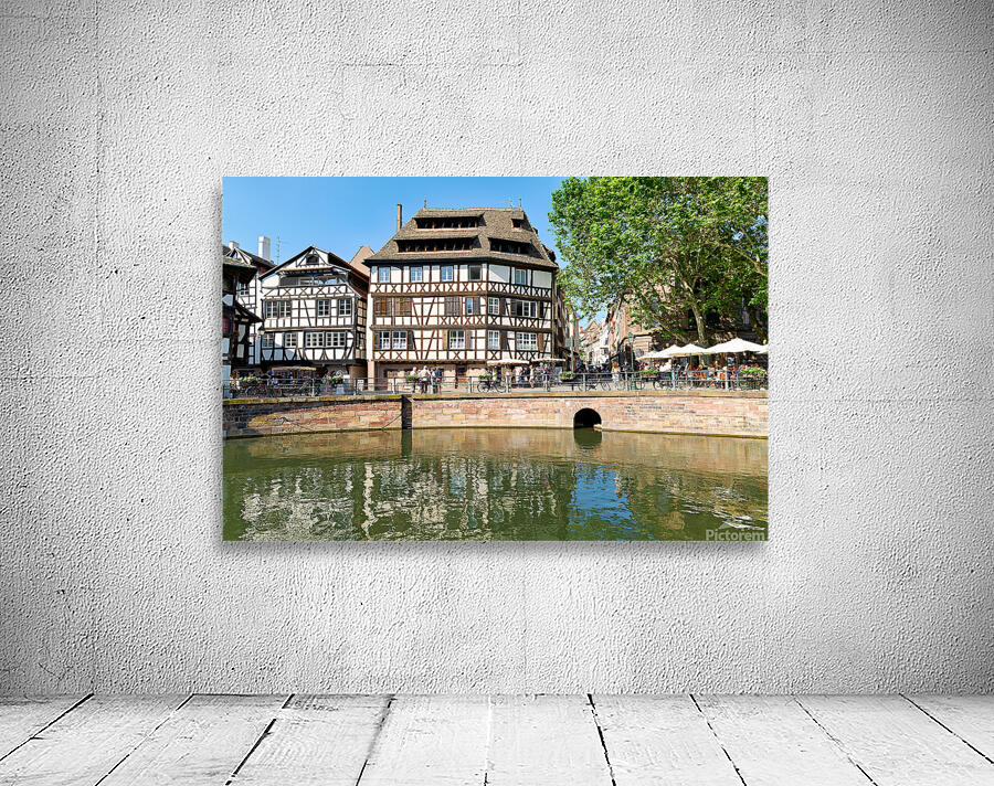Colored timber houses by the water in Petit France district Wall Preview