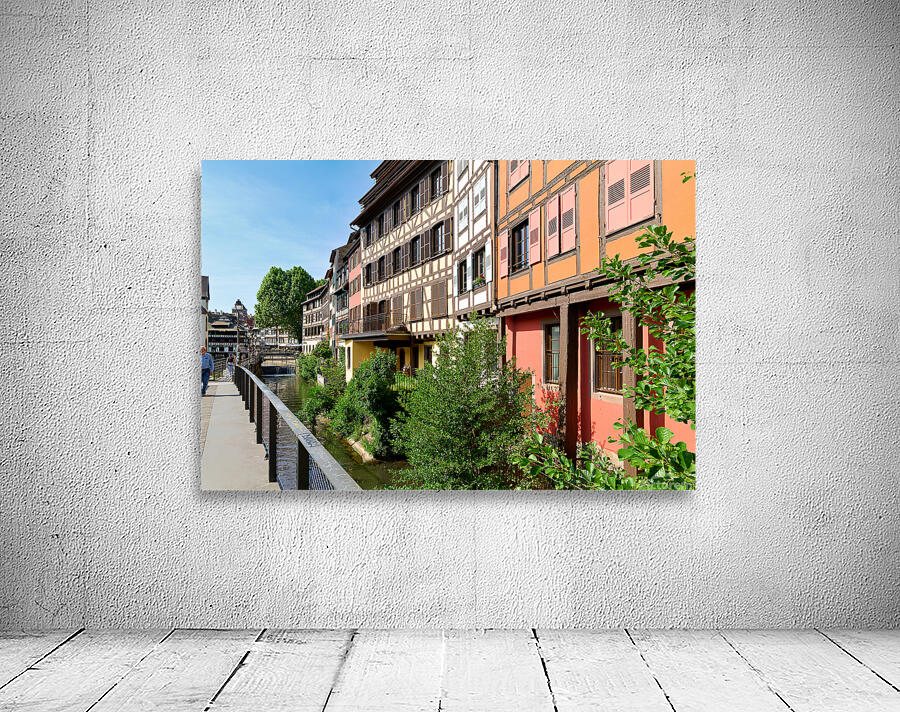 Timber houses by the canal in Strasbourgs Petit France district Wall Preview