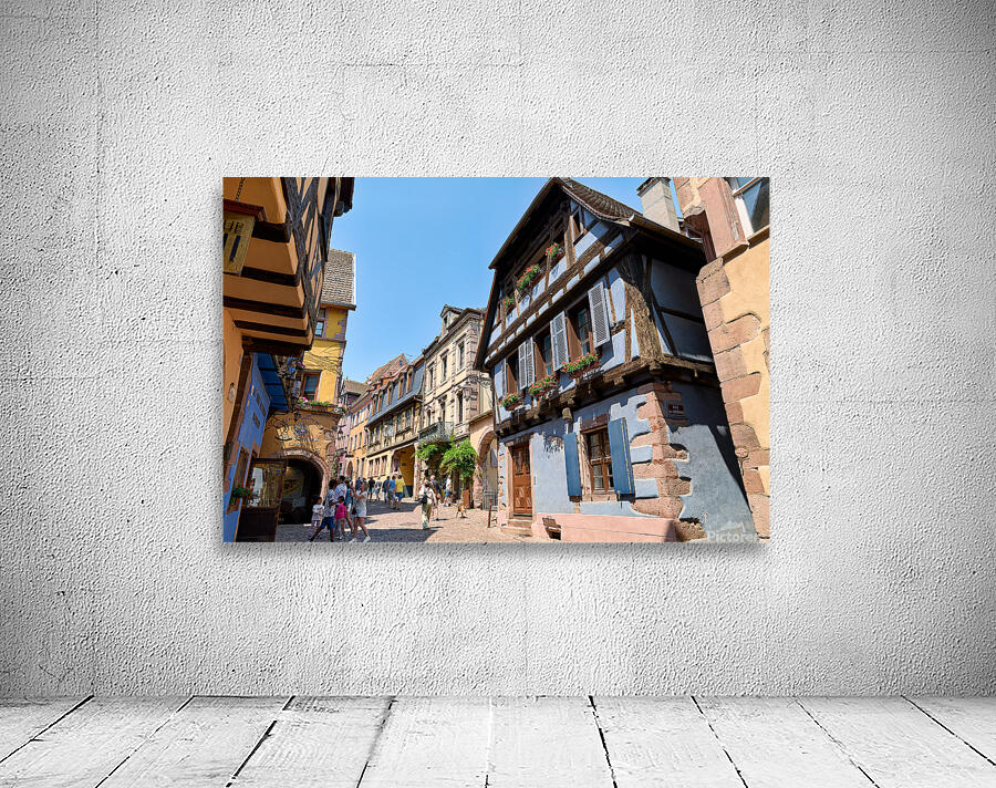 Visitors discover timber houses in Riquewihr Alsace Wall Preview