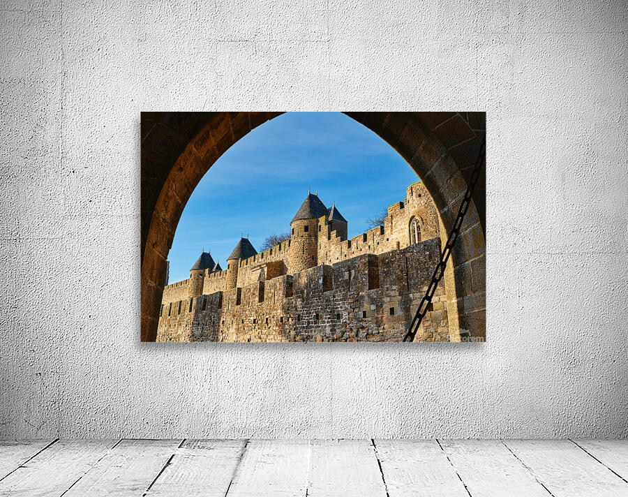 Exploring the historic walls of Carcassonne in France under blue Wall Preview