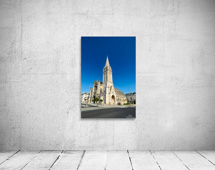 People walk near Saint Pierre church in Caen Normandy Wall Preview