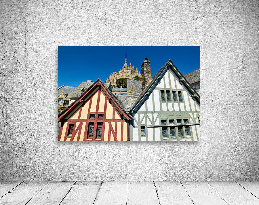 Visit Mont Saint Michel in Normandy France under clear blue sky Wall Preview