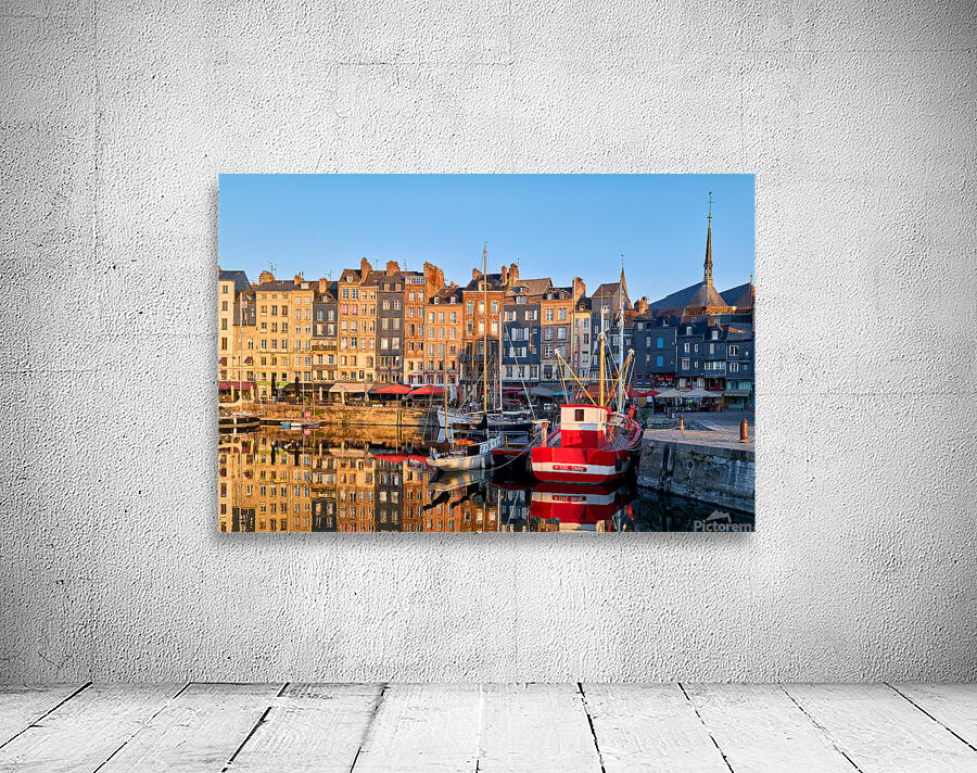 Sunrise at Honfleur harbour in Normandy France with reflections Wall Preview