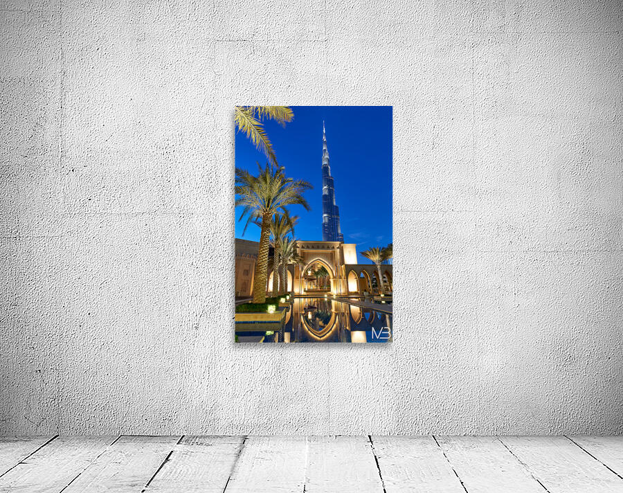 Burj Khalifa stands tall at night with light reflections in Duba Wall Preview