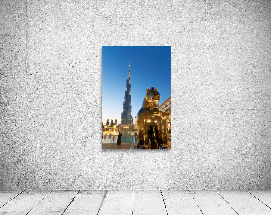 Burj Khalifa and golden horse statue at dusk in Dubai Wall Preview