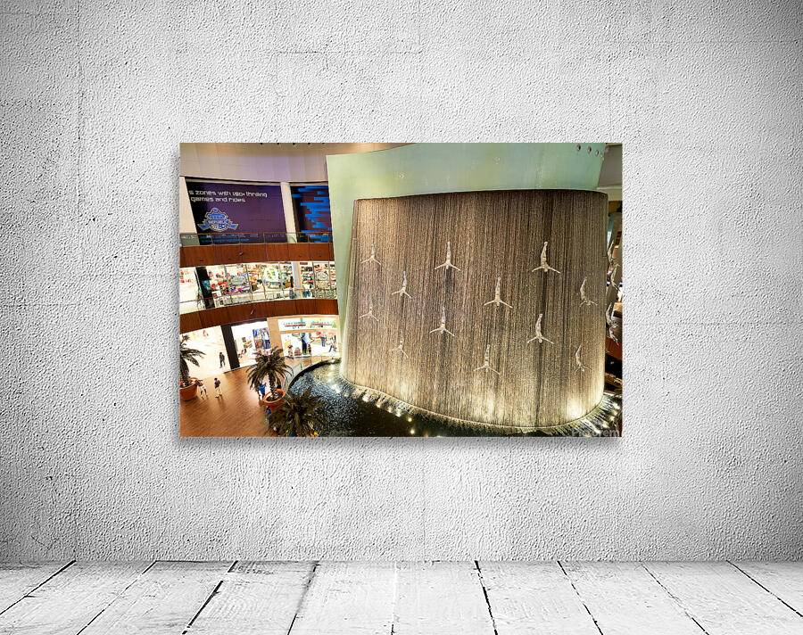 Indoor waterfall with diver sculptures in a mall in Dubai UAE Wall Preview