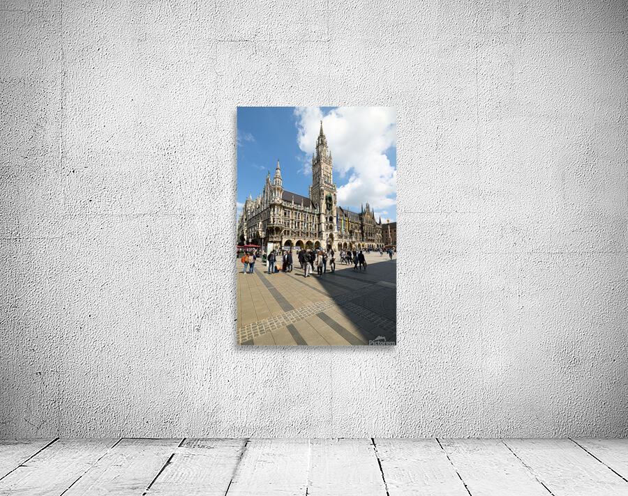 Visitors exploring Marienplatz near Munich Town Hall in Bavaria Wall Preview