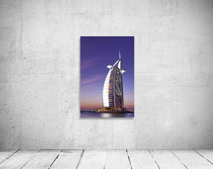 Burj Al Arab hotel illuminated at dusk in Dubai UAE Wall Preview