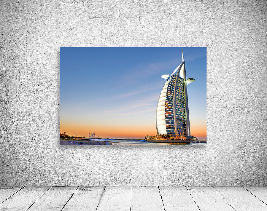 Burj Al Arab shines during sunset in Dubai UAE Wall Preview