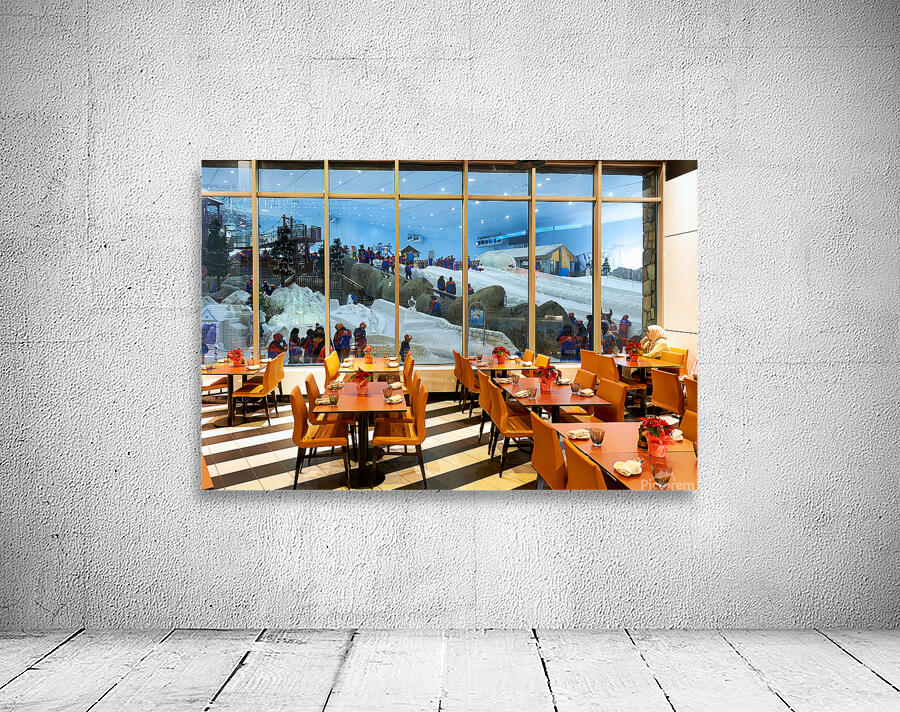 Restaurant offers view of snow activities at indoor park in Duba Wall Preview