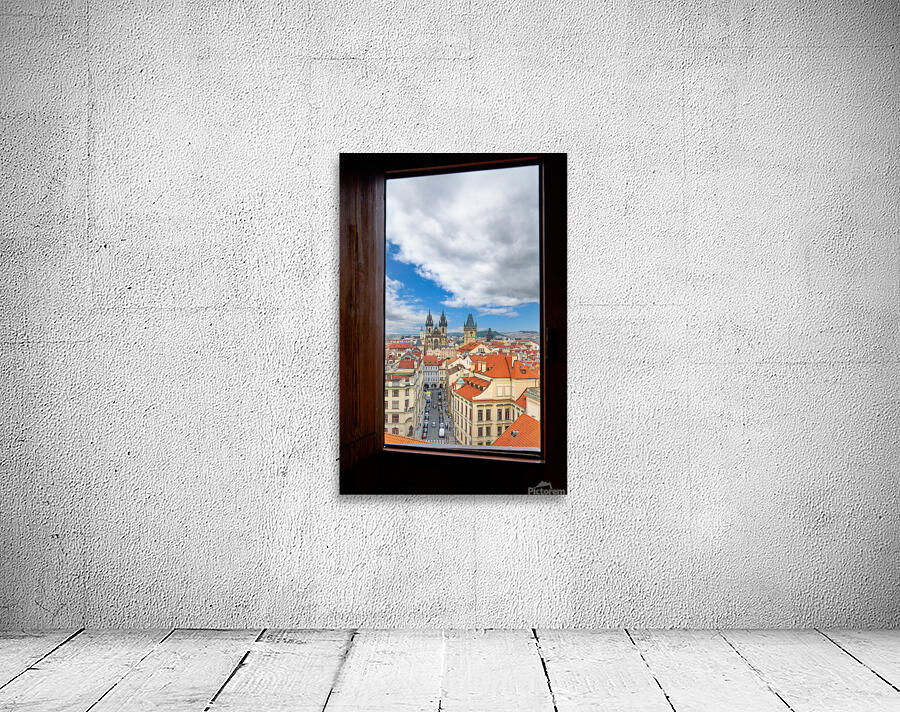 Prague cityscape from window Tyn Church red roofs. Wall Preview