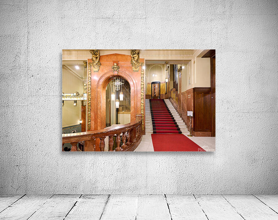 Elegant interior with red carpeted staircase and ornate gold det Wall Preview