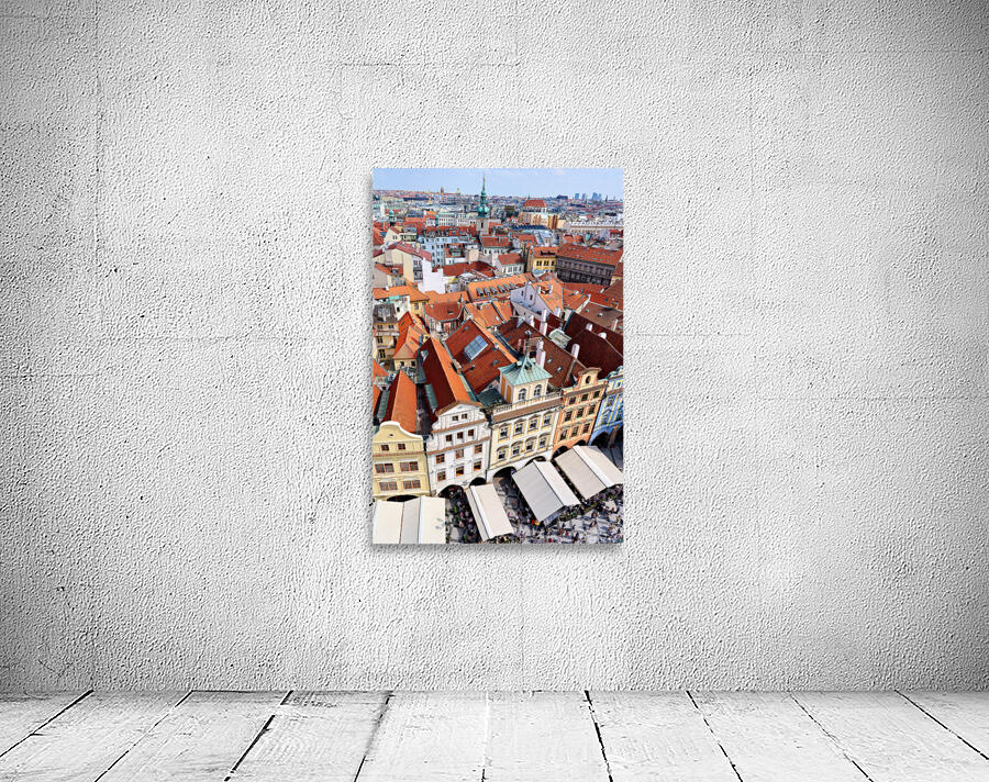 Aerial view of Pragues historic red roofed cityscape and bustli Wall Preview