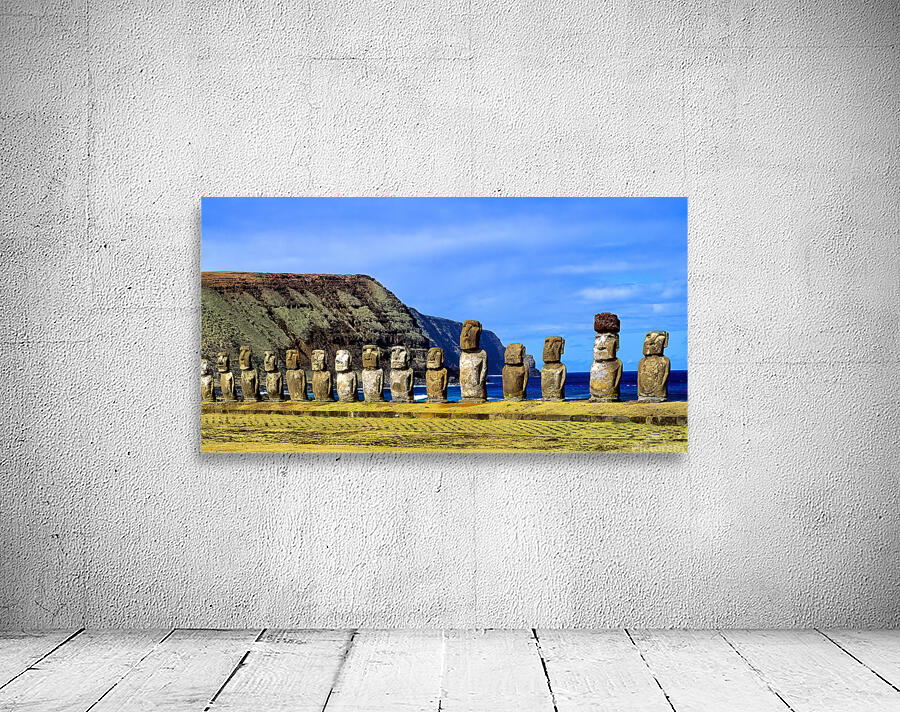 Easter Island Moai statues against ocean and cliffs. Wall Preview