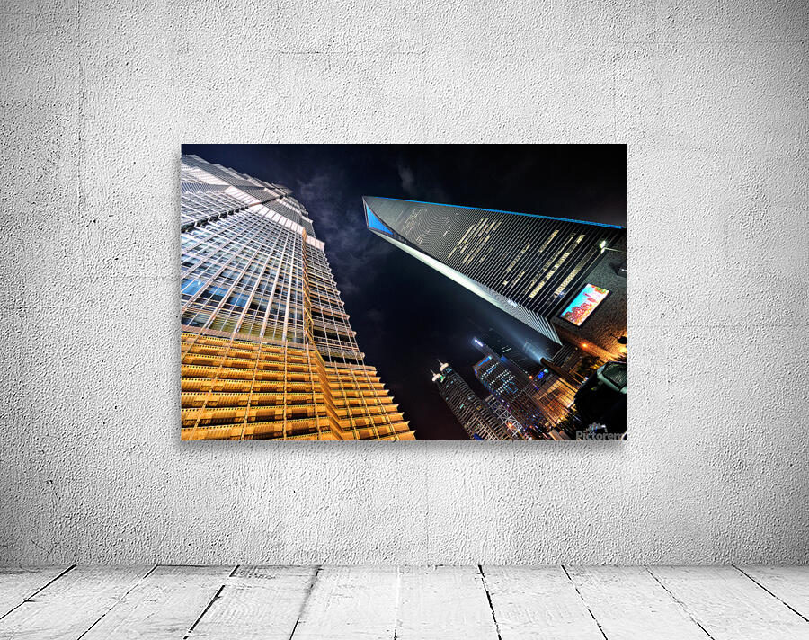 City skyline with skyscrapers shining bright in Shanghai at nigh Wall Preview