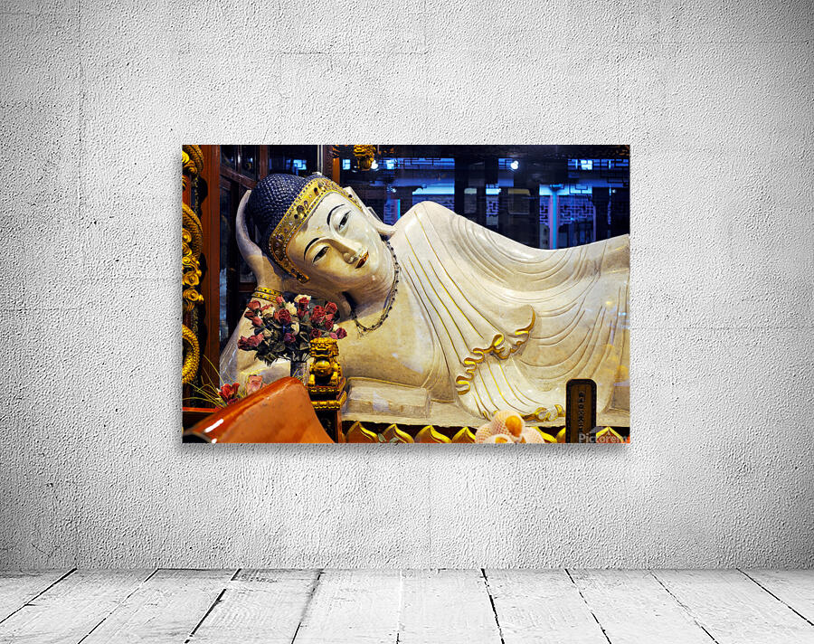 Reclining Buddha statue in Shanghai temple with flowers and gold Wall Preview