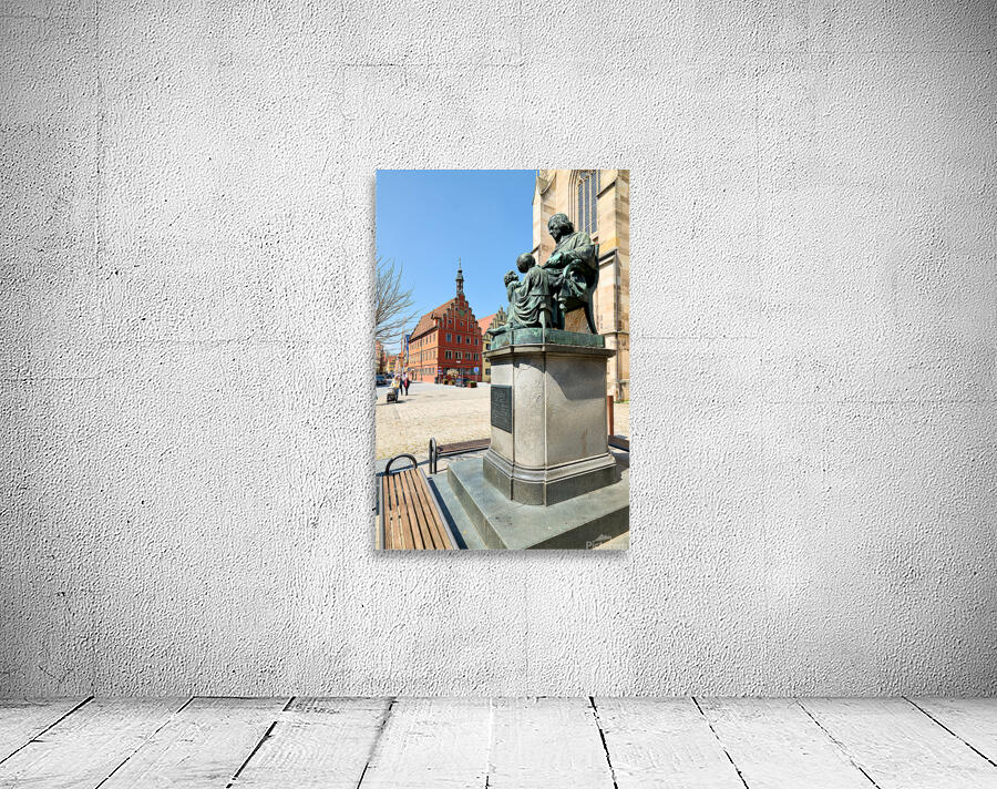 Visitors explore Dinkelsbuhl old town and historical statue Wall Preview