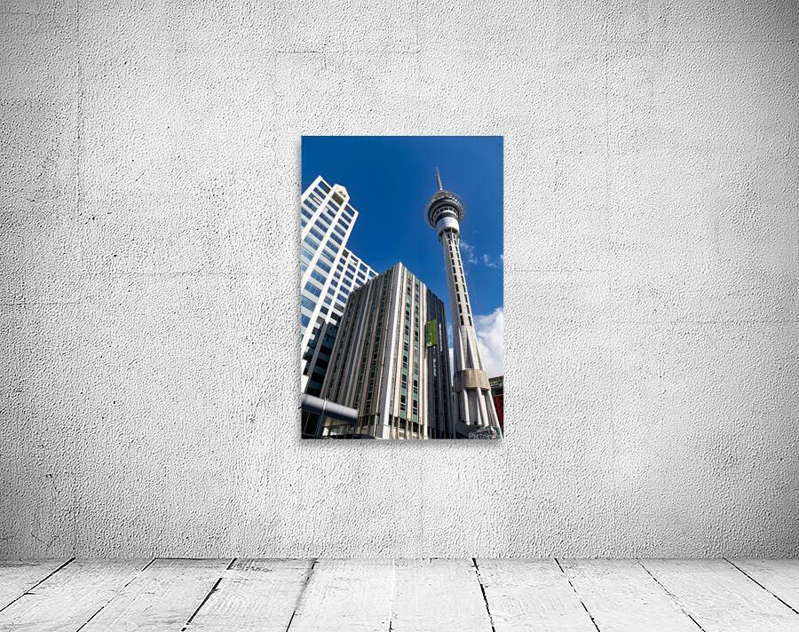 Sky Tower in Auckland showing city buildings and clear sky Wall Preview