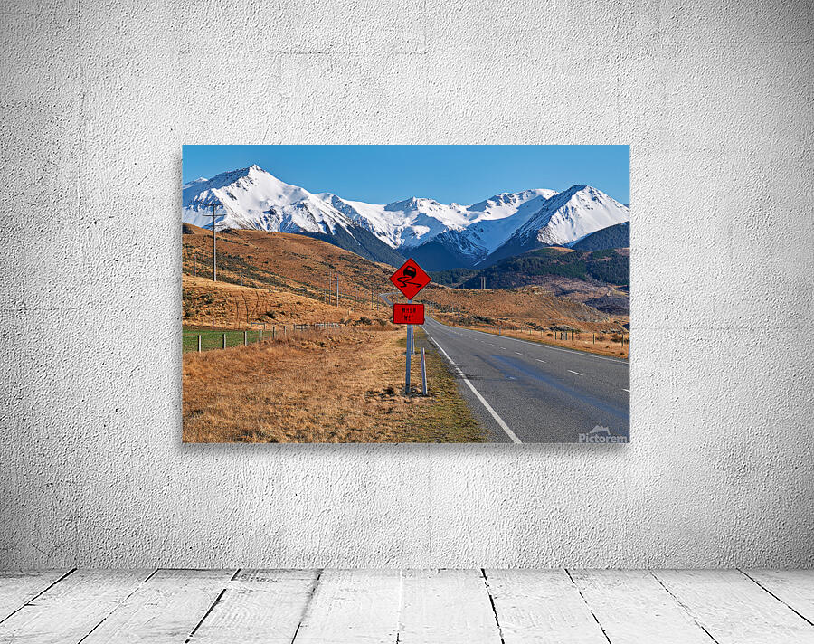 Driving on State Highway 73 near Arthur Pass in New Zealand Wall Preview