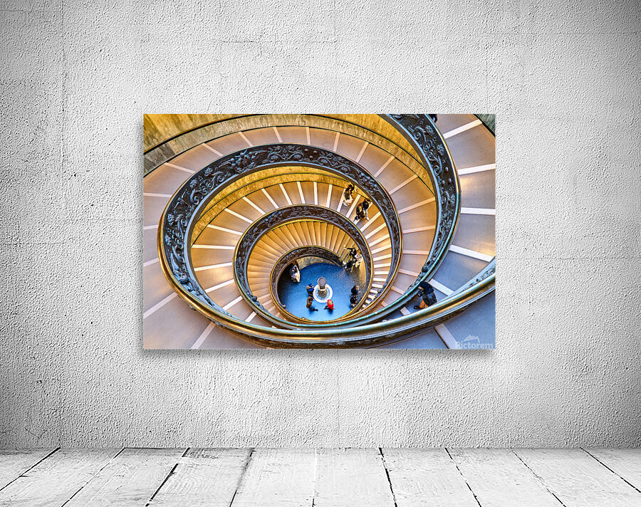 Visitors walk down Bramante staircase in Vatican Museums in Rome Wall Preview
