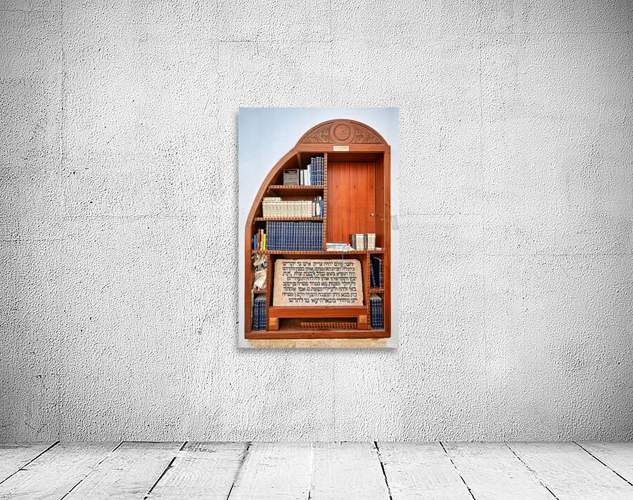 Bookshelf with religious texts in Sephardic synagogues in Jerusa Wall Preview