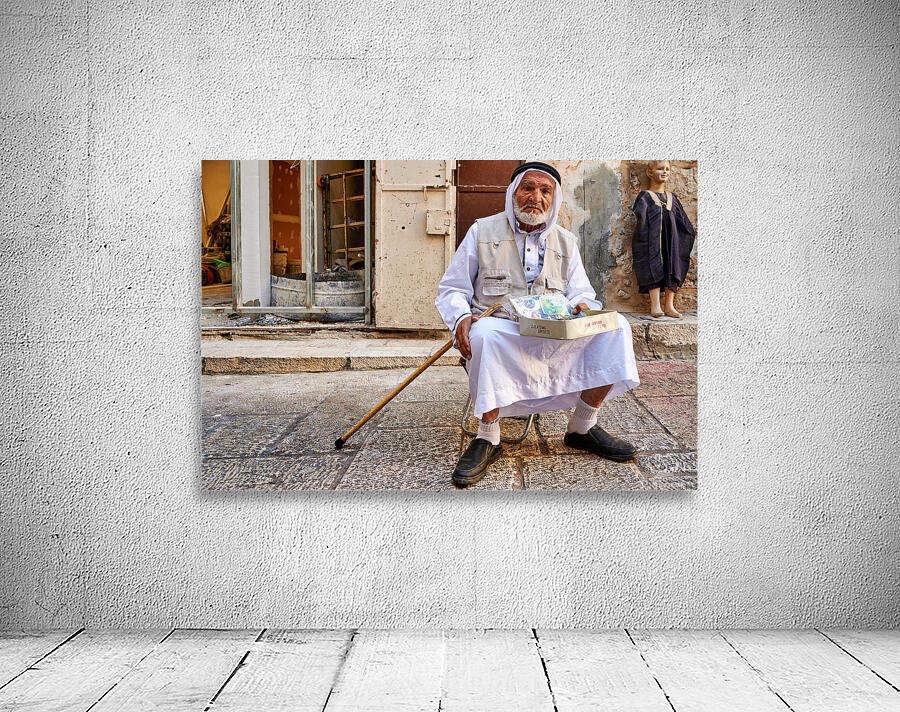 Old man sits in the old city of Jerusalem asking for help Wall Preview