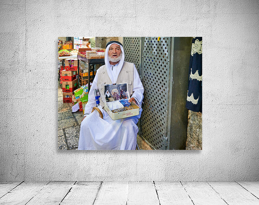 Beggar in the old city of Jerusalem seeks help from passersby Wall Preview