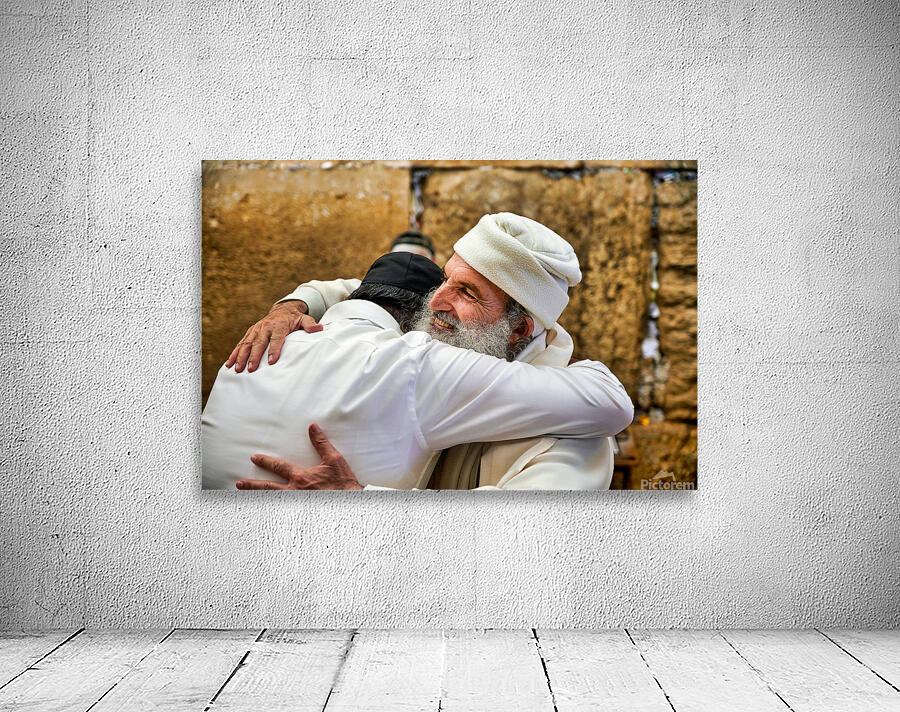 Men embrace each other at the Wailing Wall in Jerusalem Wall Preview